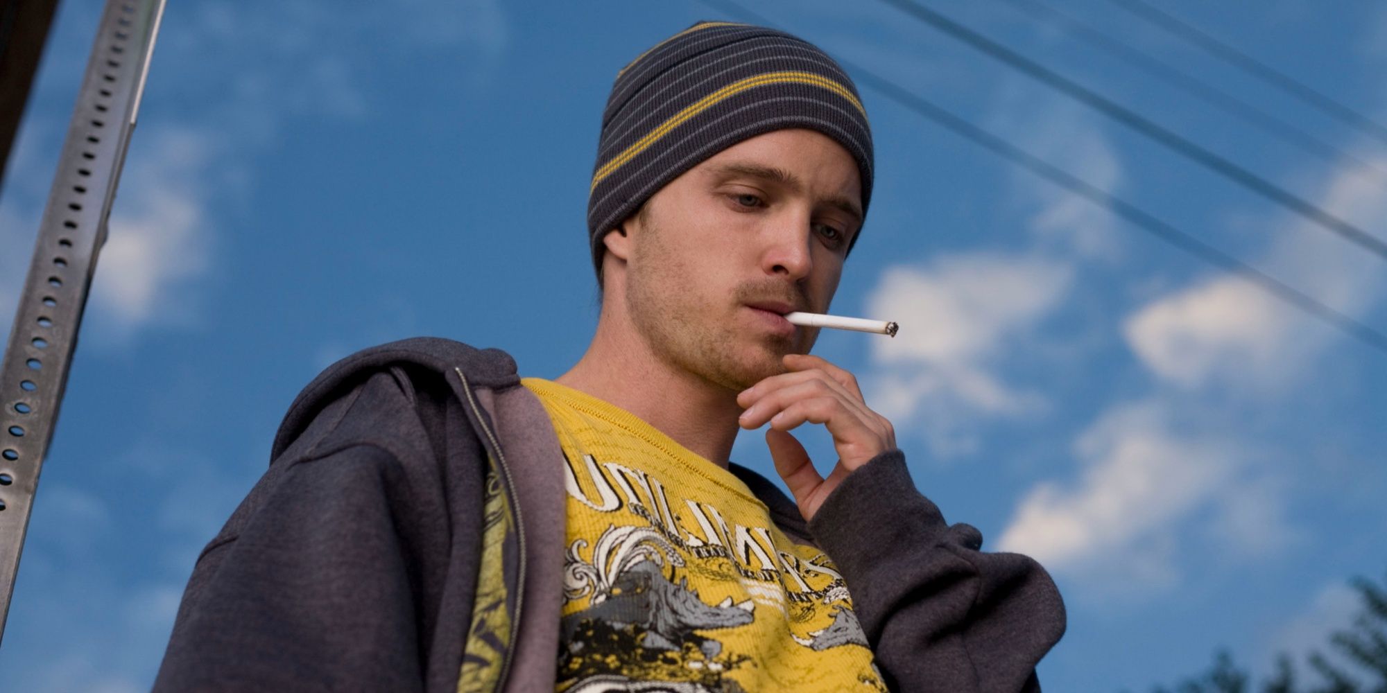 Jessie Pinkman (Aaron Paul) smokes a cigarette in Breaking Bad