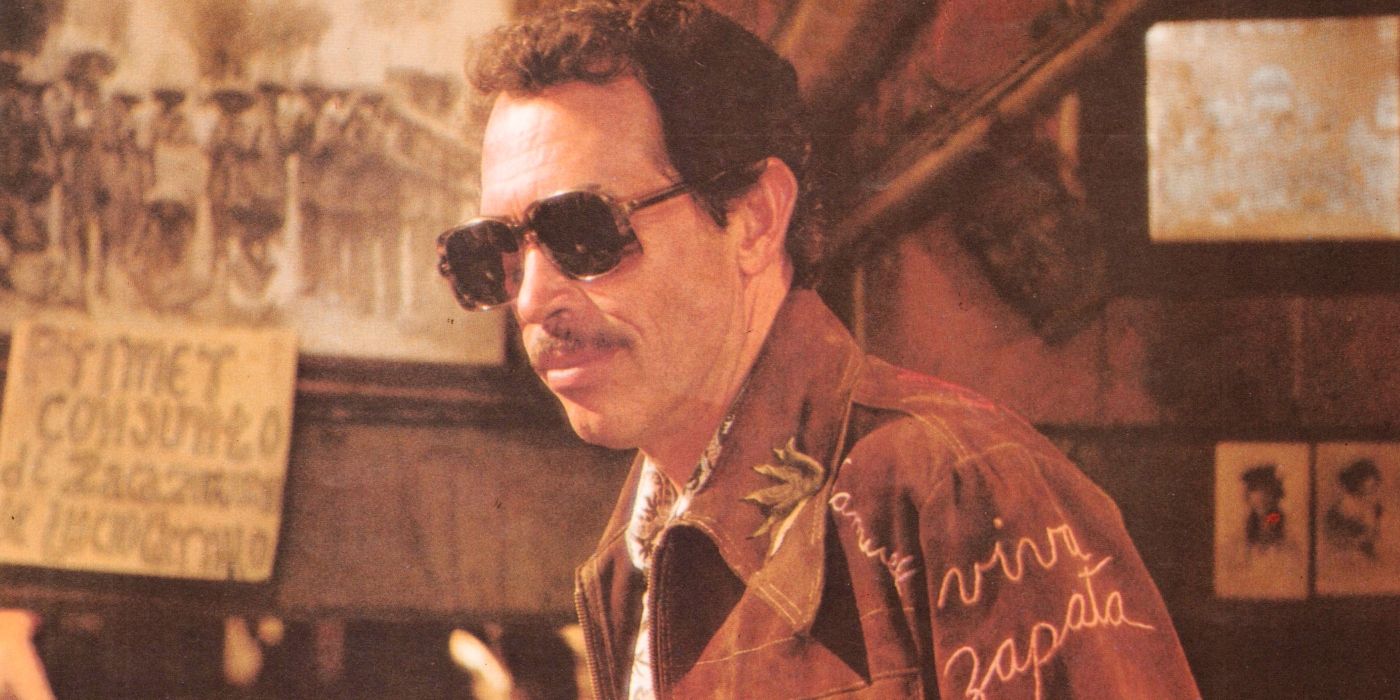 Warren Oates como Benny con gafas de sol en 