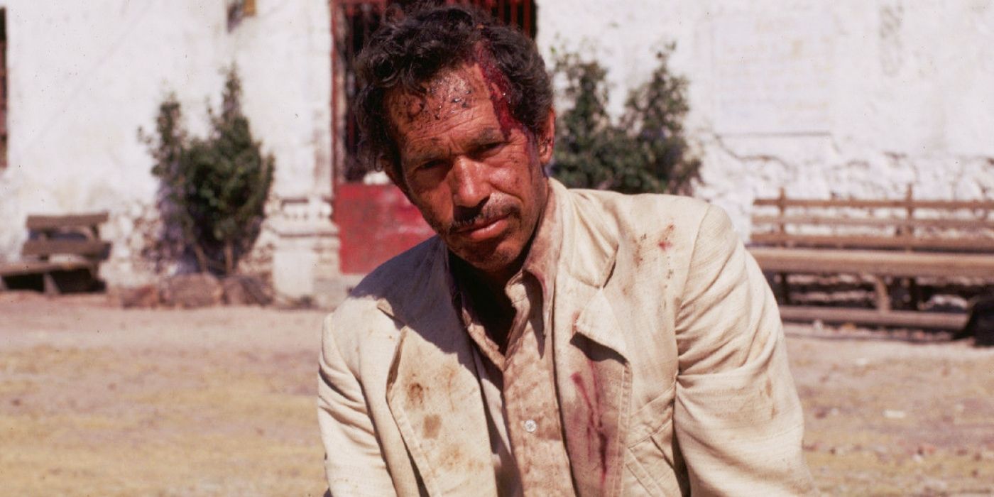 Warren Oates mientras Benny recibe una paliza en 