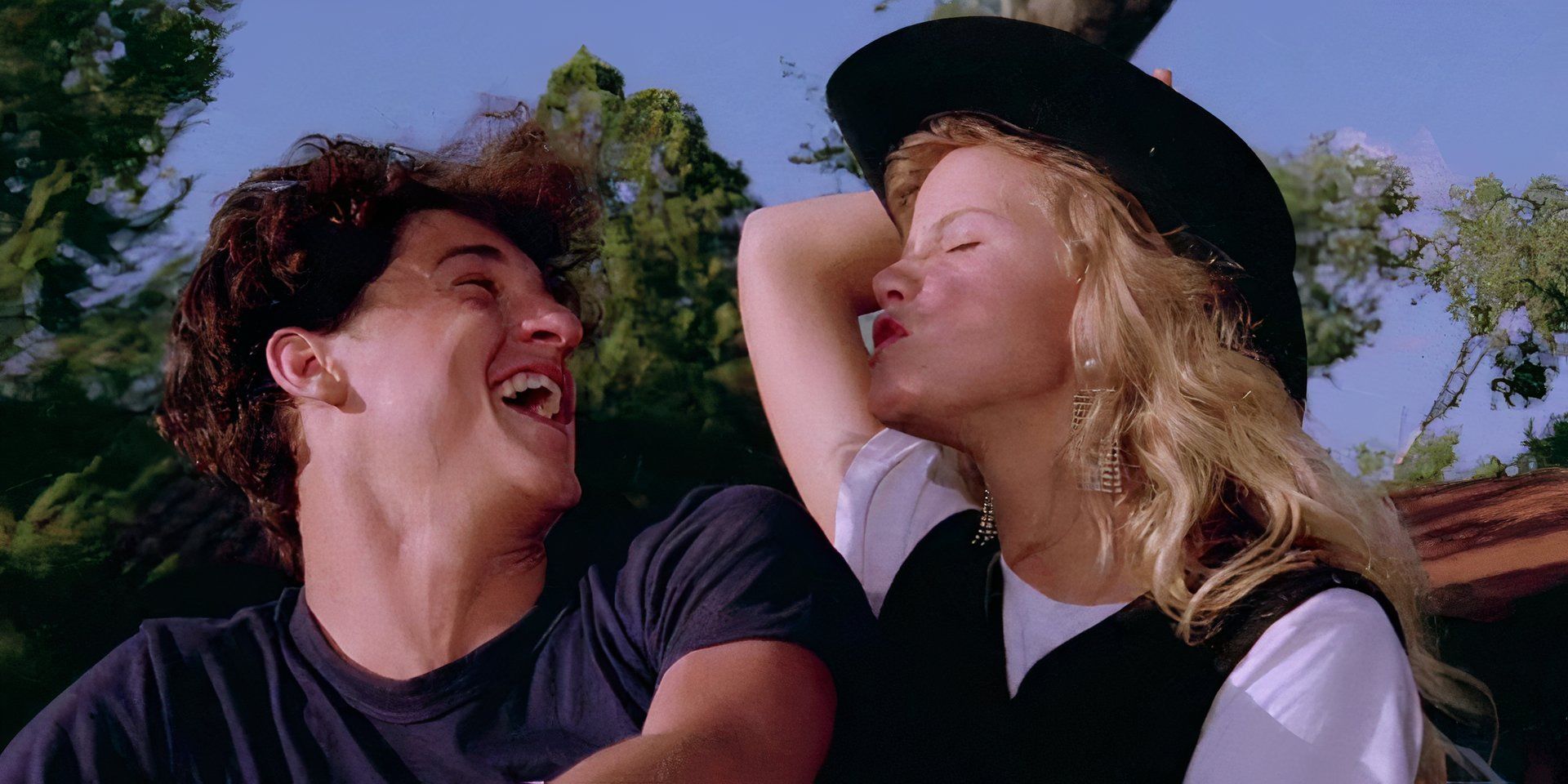 Patrick Dempsey as Ronald laughing at Amanda Peterson as Cindy who is puckering her lips in Can&rsquo;t Buy Me Love
