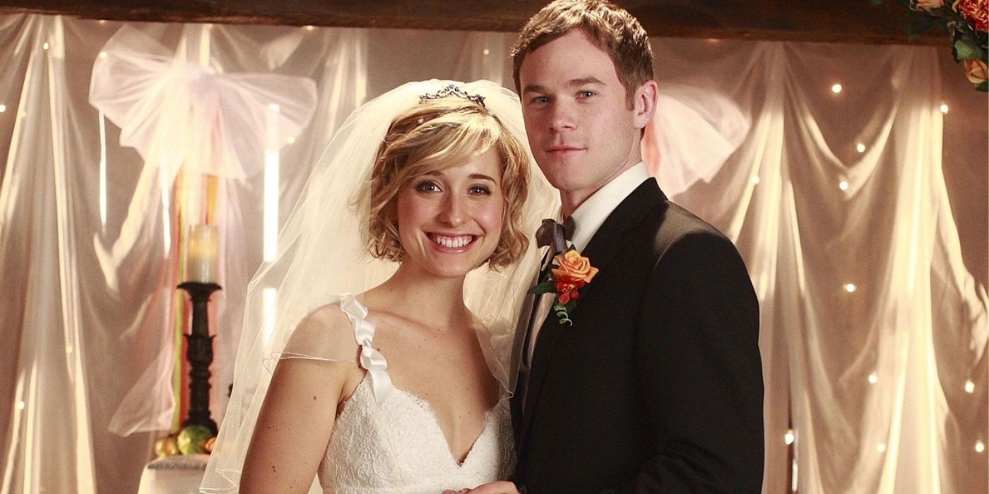 Chloe and Jimmy pose for their wedding photo in Smallville