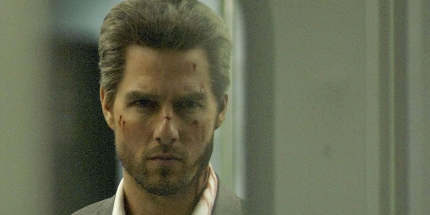 Tom Cruise's Vincent looking menacingly through a subway window in Collateral. 