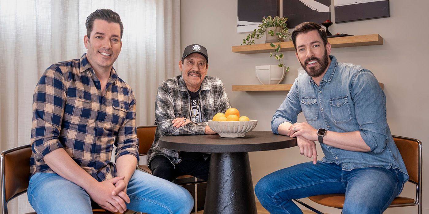 Danny Trejo With Drew and Jonathan Scott sitting at a table in the next episode of Celebrity IOU