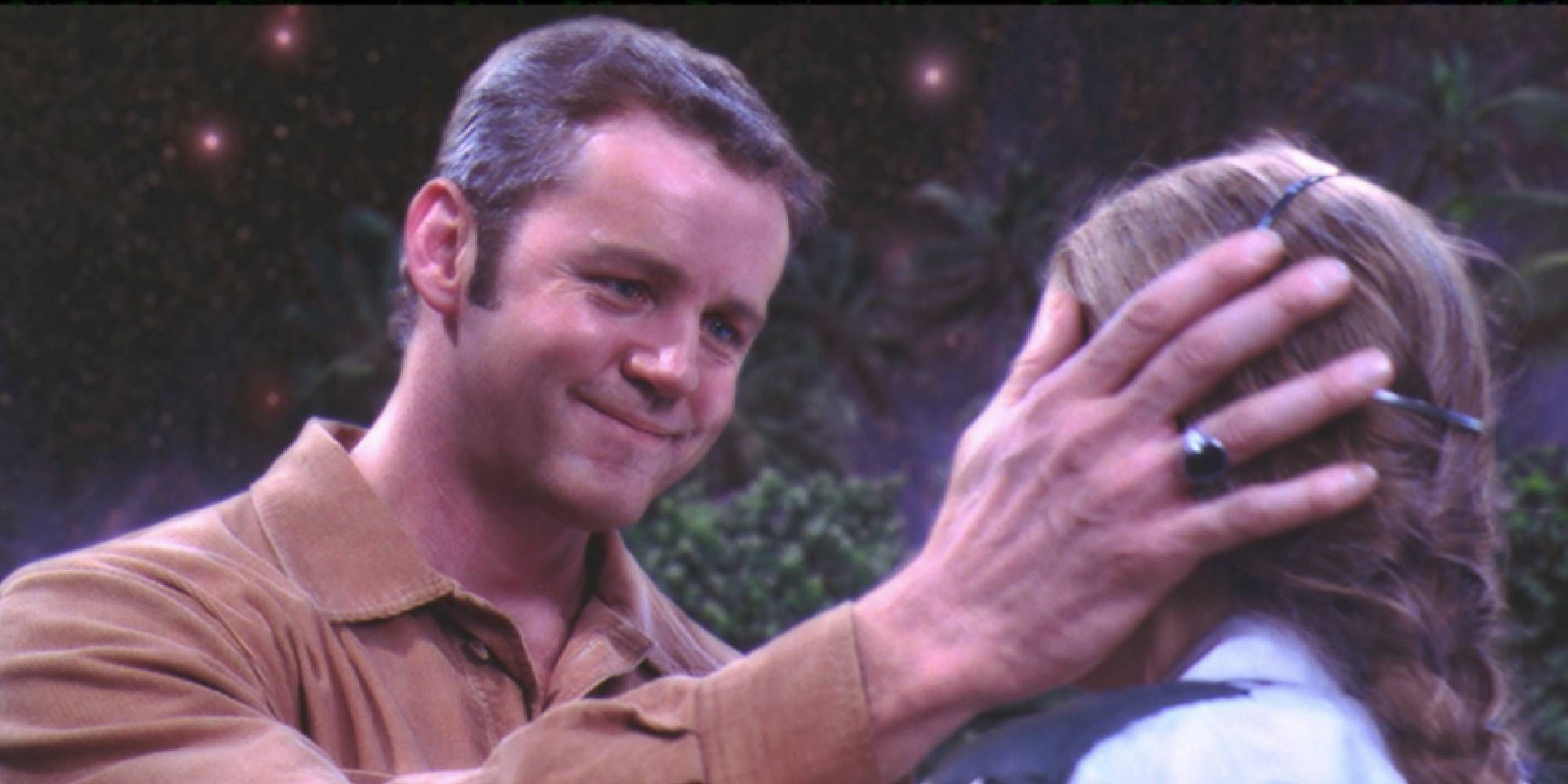 David Morse as Ted caressing his daughter's face in Contact.