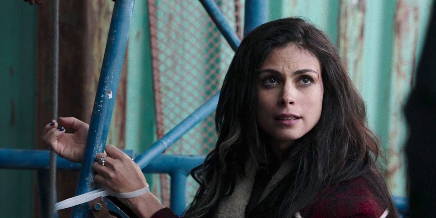 Vanessa (Morena Baccarin) iwth her hands tied to a pipe and looking at someone offscreen to the right in Deadpool