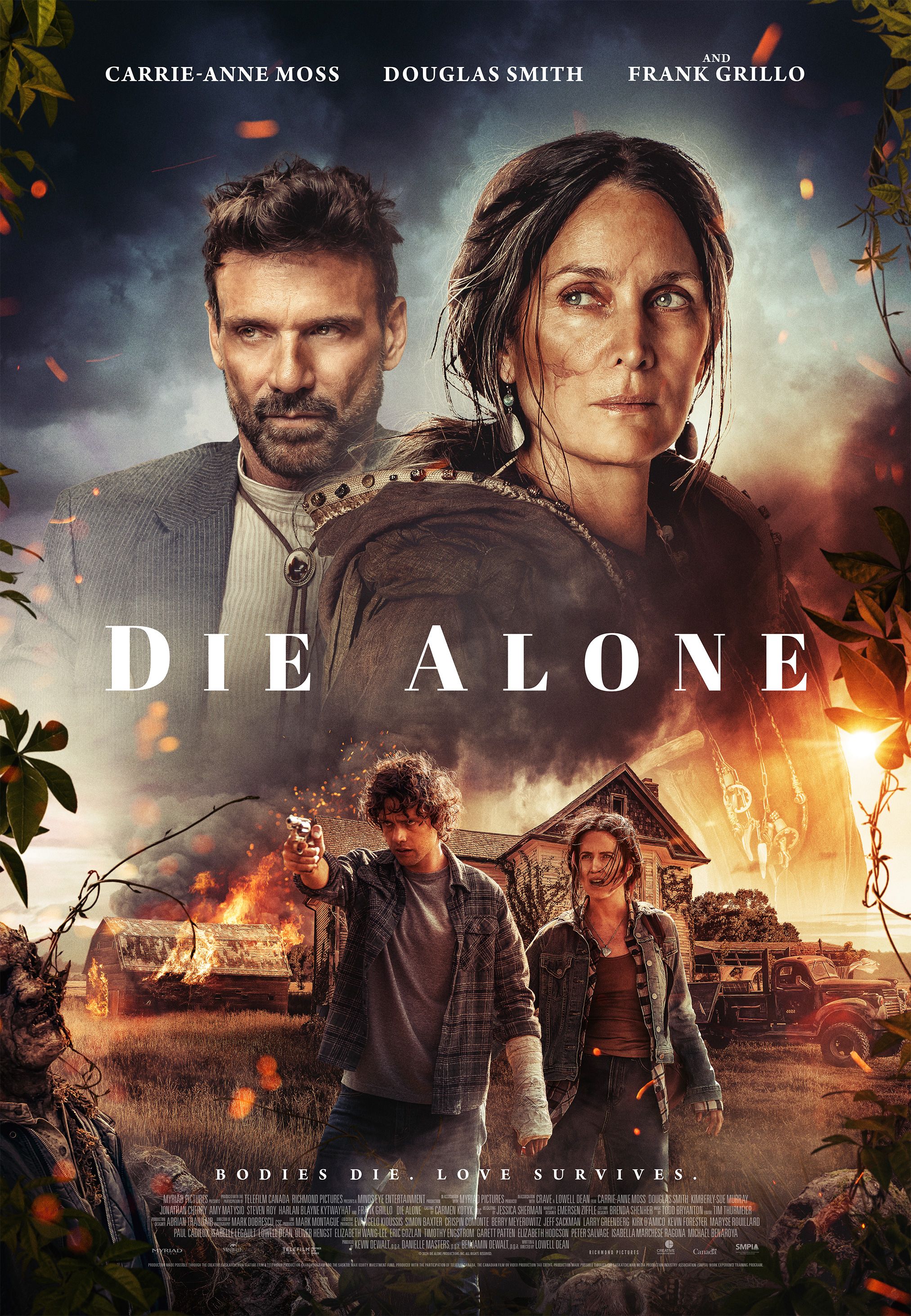 The cinema poster for “Die Alone” with Carrie-Anne Moss, Frank Grillo and Douglas Smith