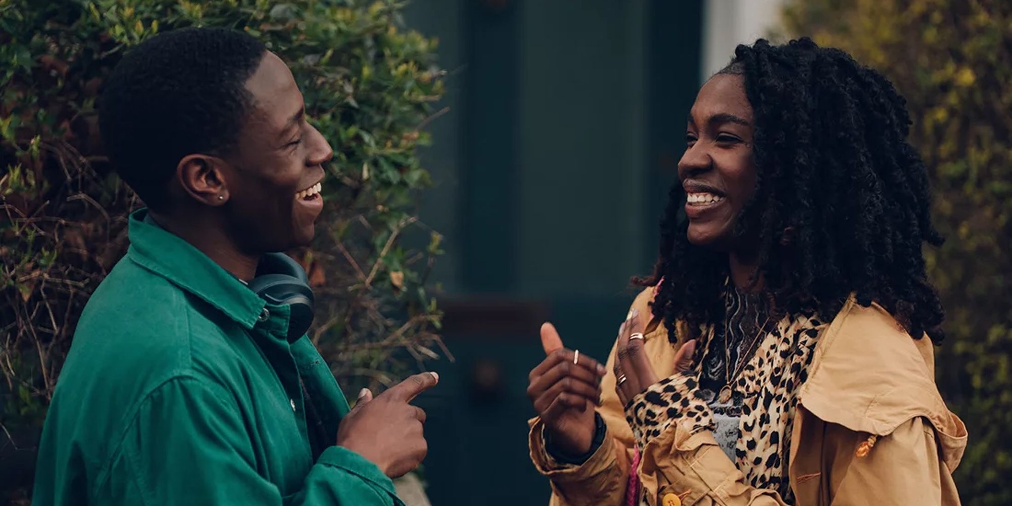 Dom (David Jonsson) and Yas (Vivian Oparah) smiling at each other in Rye Lane
