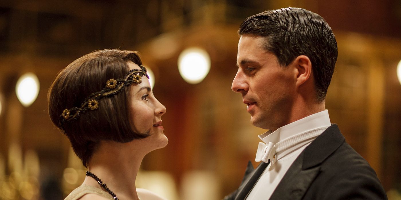 Mary, played by Michelle Dockery, dancing with Henry, played by Matthew Goode, in ' Downton Abbey'.