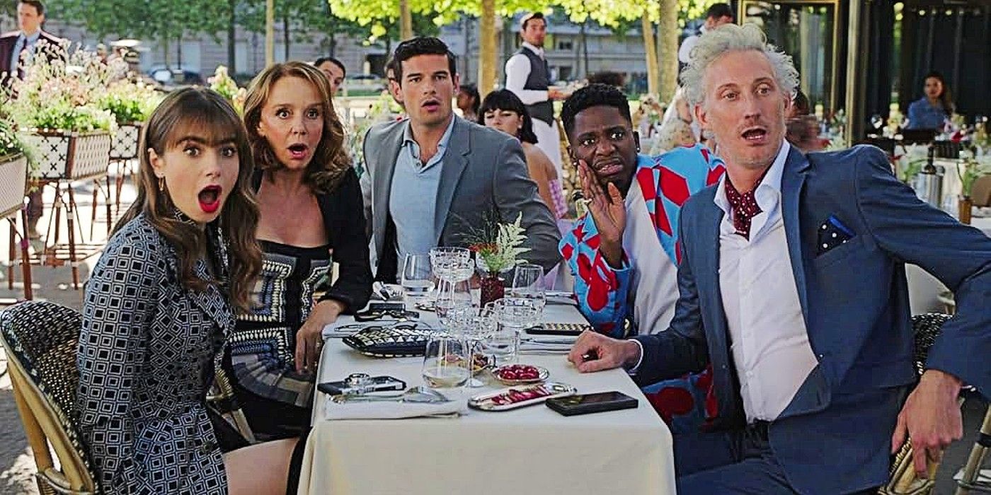 Emily, Sylvie, Nicholas, Julian and Luc are eating at Emily in Paris. They all look past the camera with shocked faces.