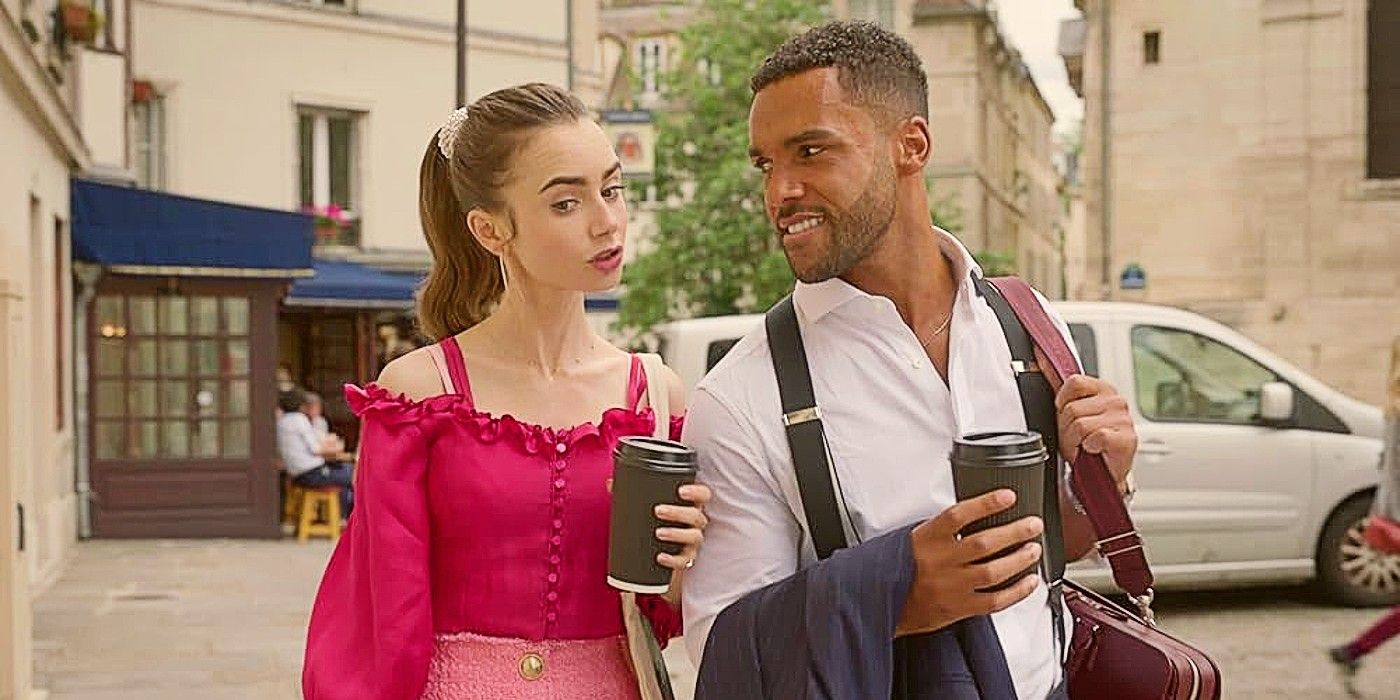 Emily and Alfie walk together in Emily in Paris, both holding coffee in their hands and he smiles at her