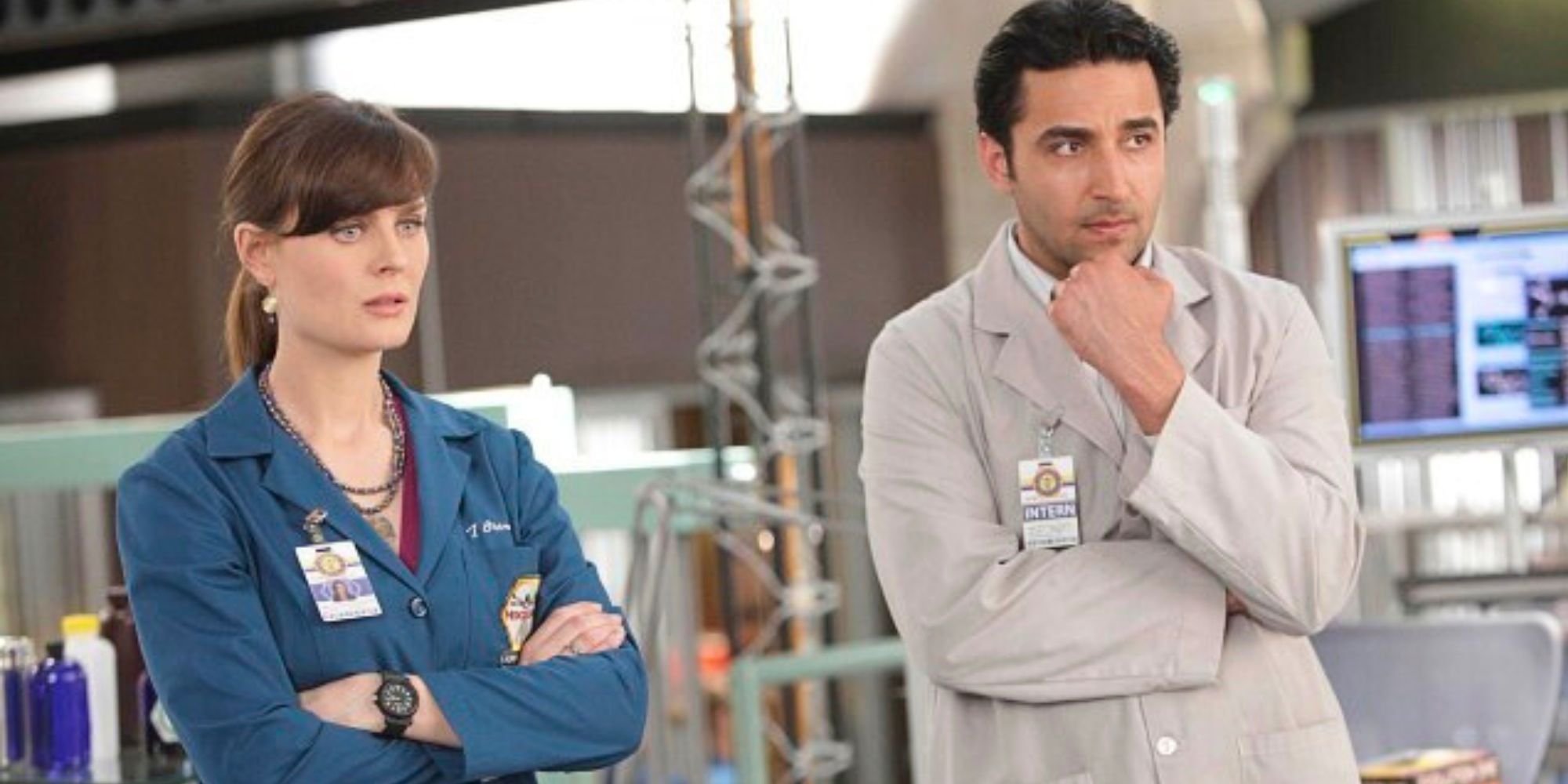 Emily Deschanel standing next to Pej Vahdat in Bones.