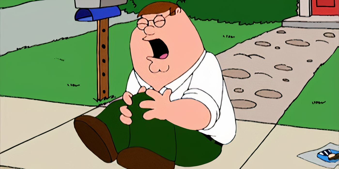 Peter Griffin sitting on the ground clutching his knee and screaming in pain in Family Guy