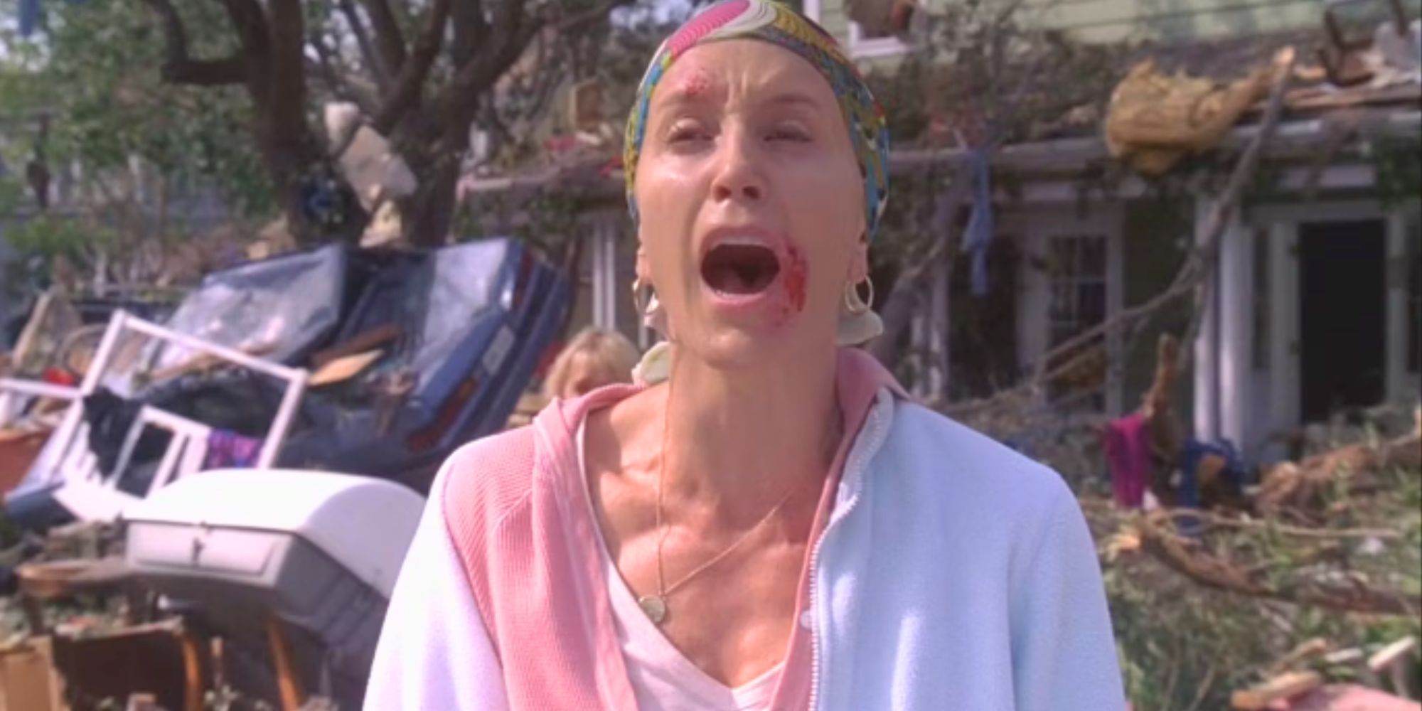 Felicity Huffman crying while standing in front of her house after a tornado in Desperate Housewives