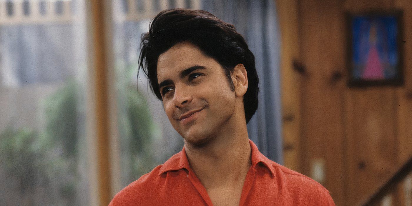 Uncle Jesse in the kitchen on Full House smiling