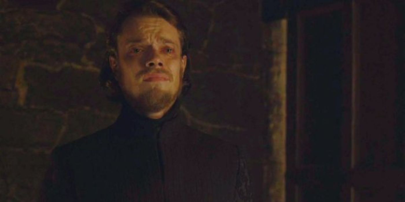 Theon Greyjoy crying with a broken expression on his face in Game of Thrones