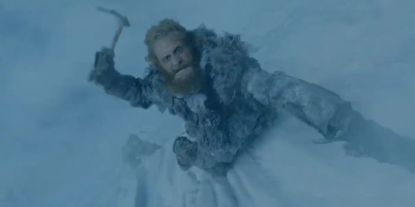 Tormund Giantsbane climbing the wall in Game of Thrones