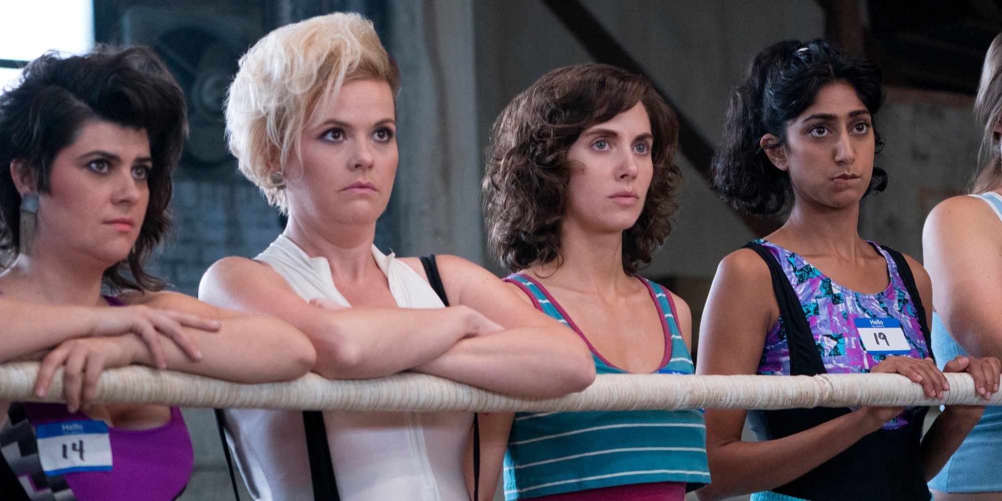 Rebekka Johnson, Kimmy Gatewood, Alison Brie, and Sunita Mani as Dawn, Stacie, Ruth, and Arthie in scene from GLOW