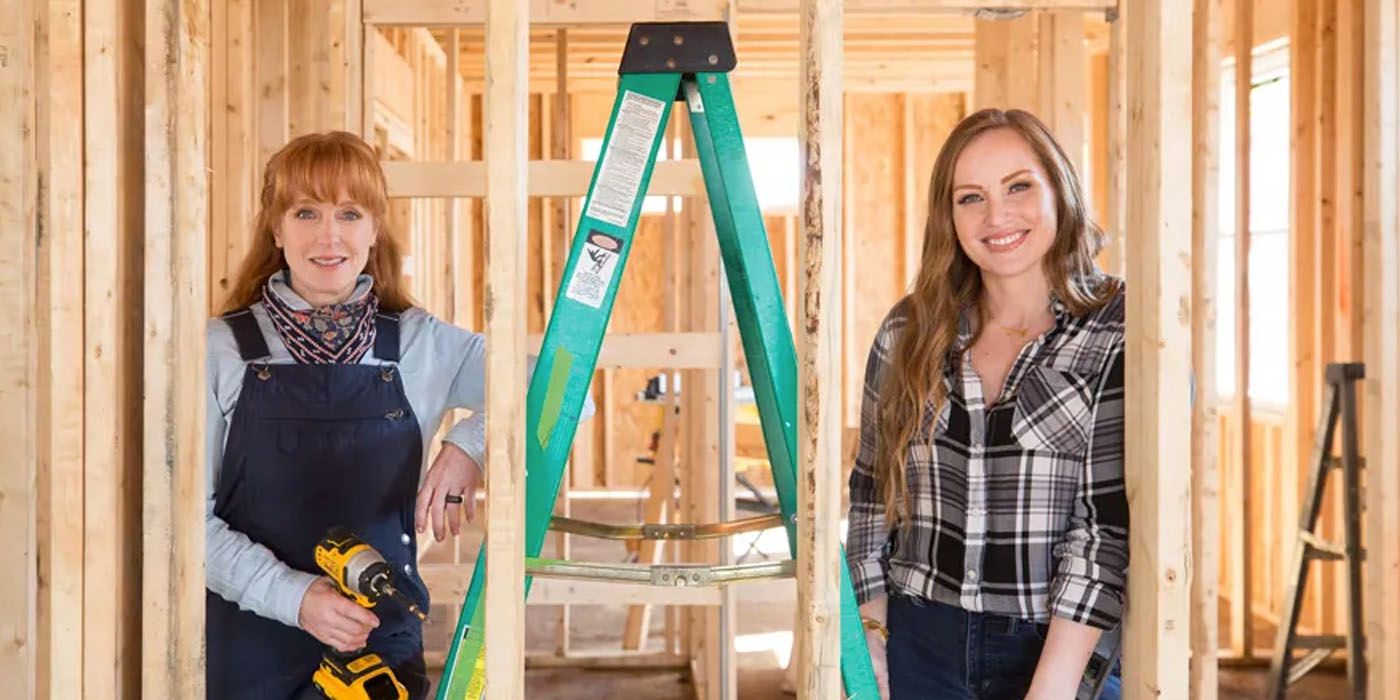 Karen E Laine and Mina Starsiak Hawk stand next to a ladder for season 6 of Good Bones