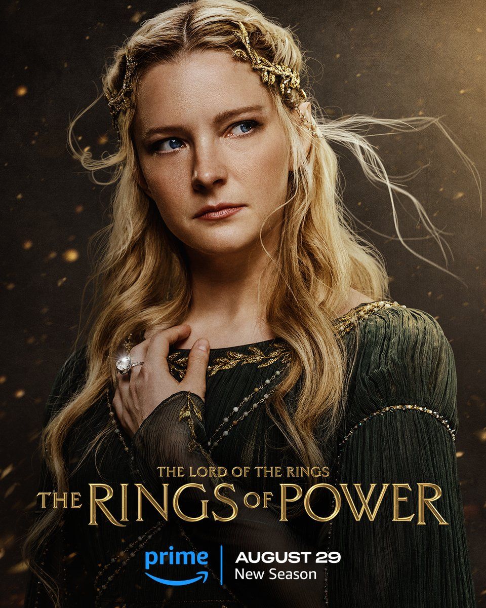 Morfydd Clark as Galadriel wearing a ring on a character poster for Rings of Power Season 2