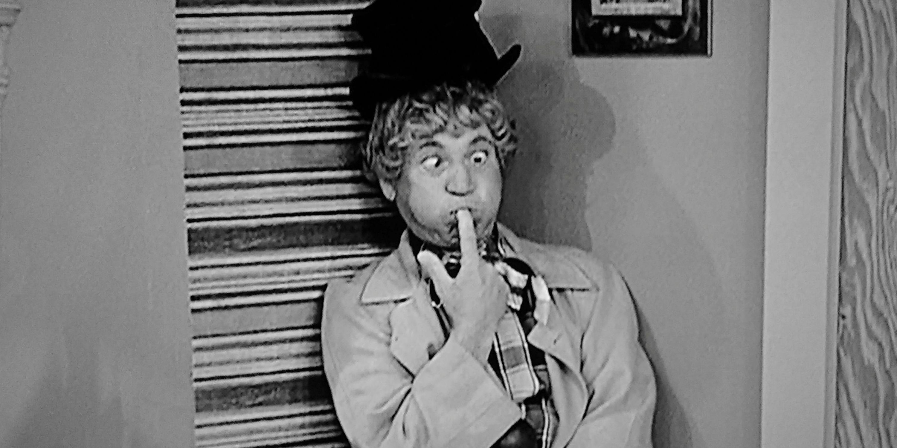 Harpo Marx puffing out his cheeks in I Love Lucy