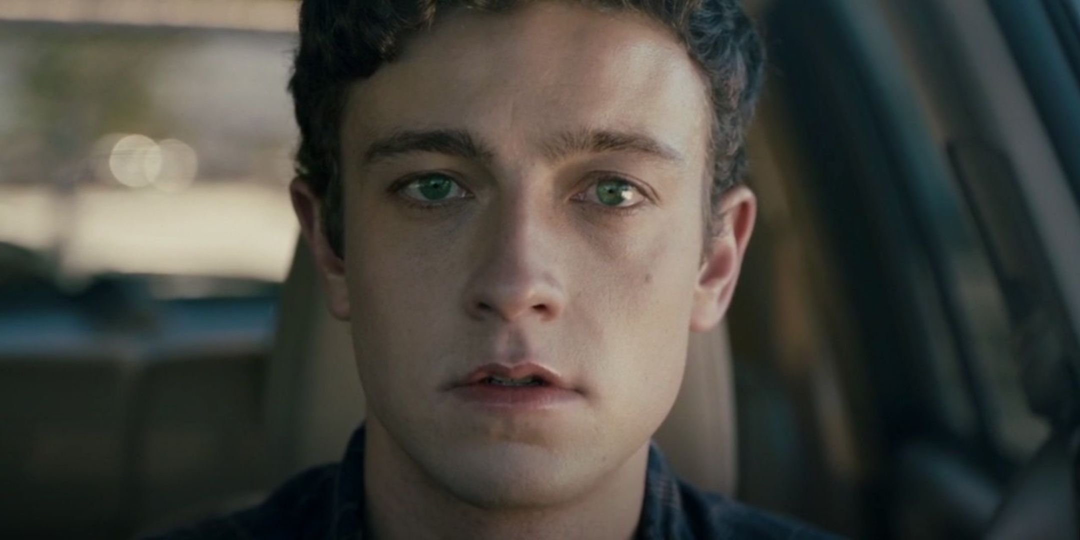 Isaac Jay as Evan staring into camera in Head Count.
