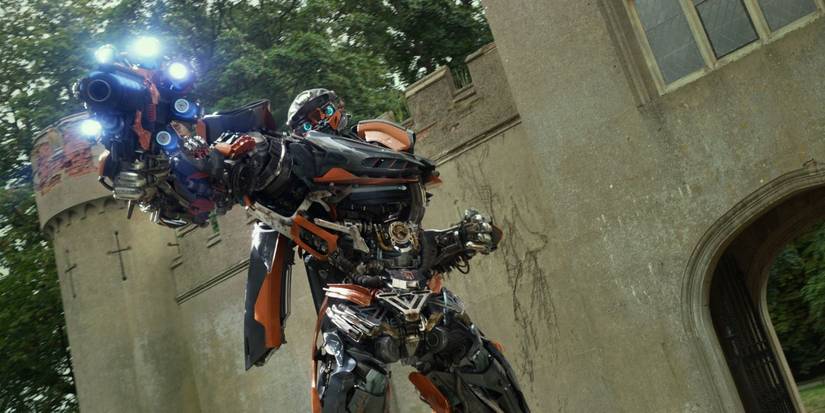 Hot Rod aiming his cannon at someone in Transformers: The Last Knight