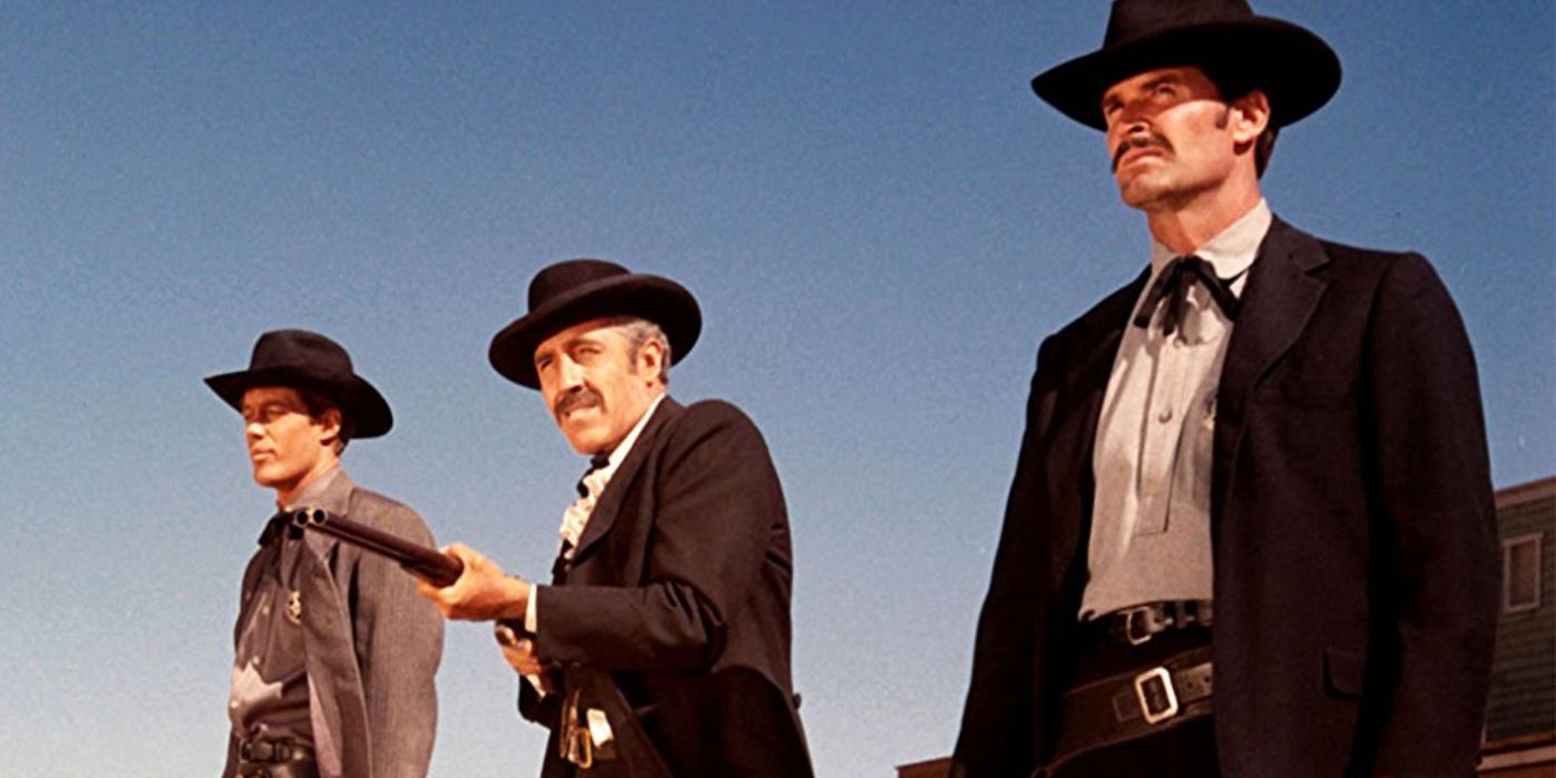 Jason Garner and Jason Robards standing and looking ahead in &lsquo;Hour of the Gun&rsquo; (1967)