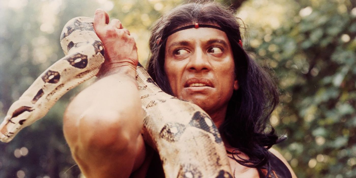 Bhaskar Roy Chowdhury with a snake in I Drink Your Blood