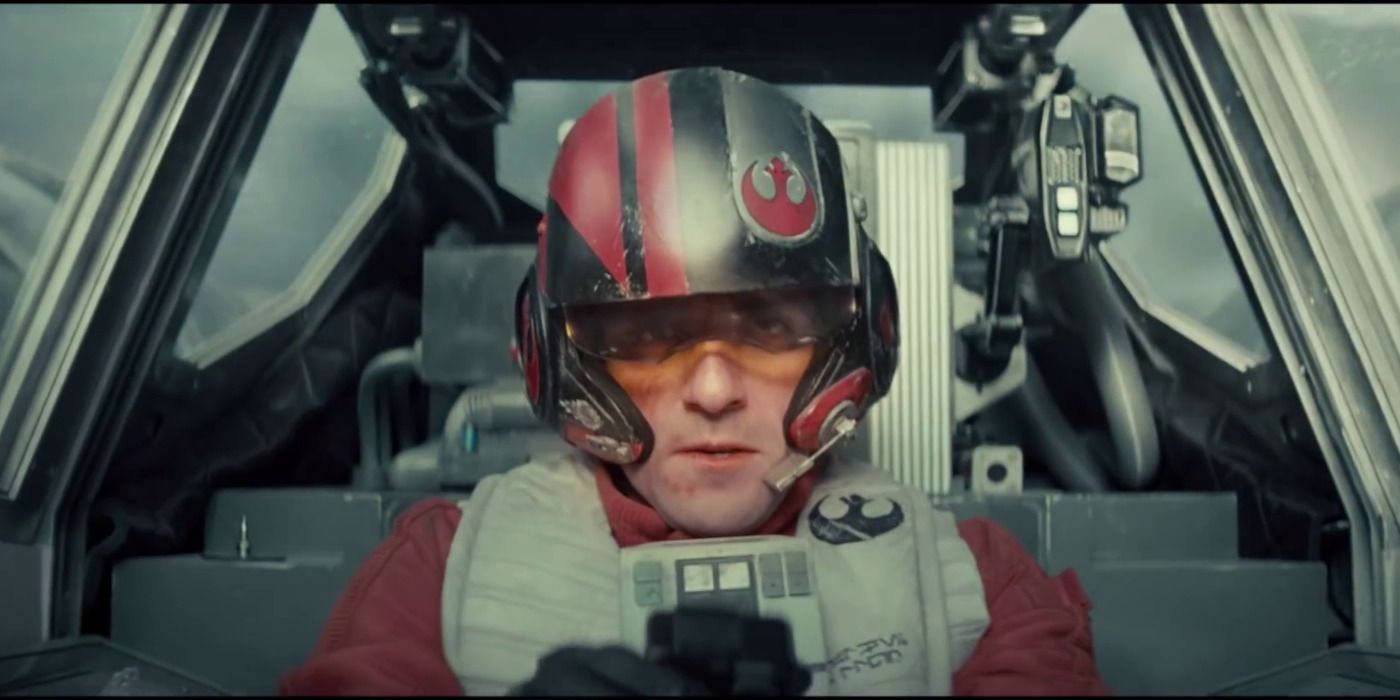Oscar Isaac as Poe Dameron piloting an X-Wing in Star Wars: The Force Awakens.