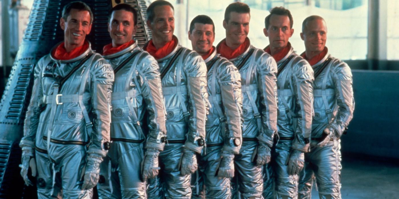 The Mercury Seven posing for a picture with a capsule in The Right Stuff