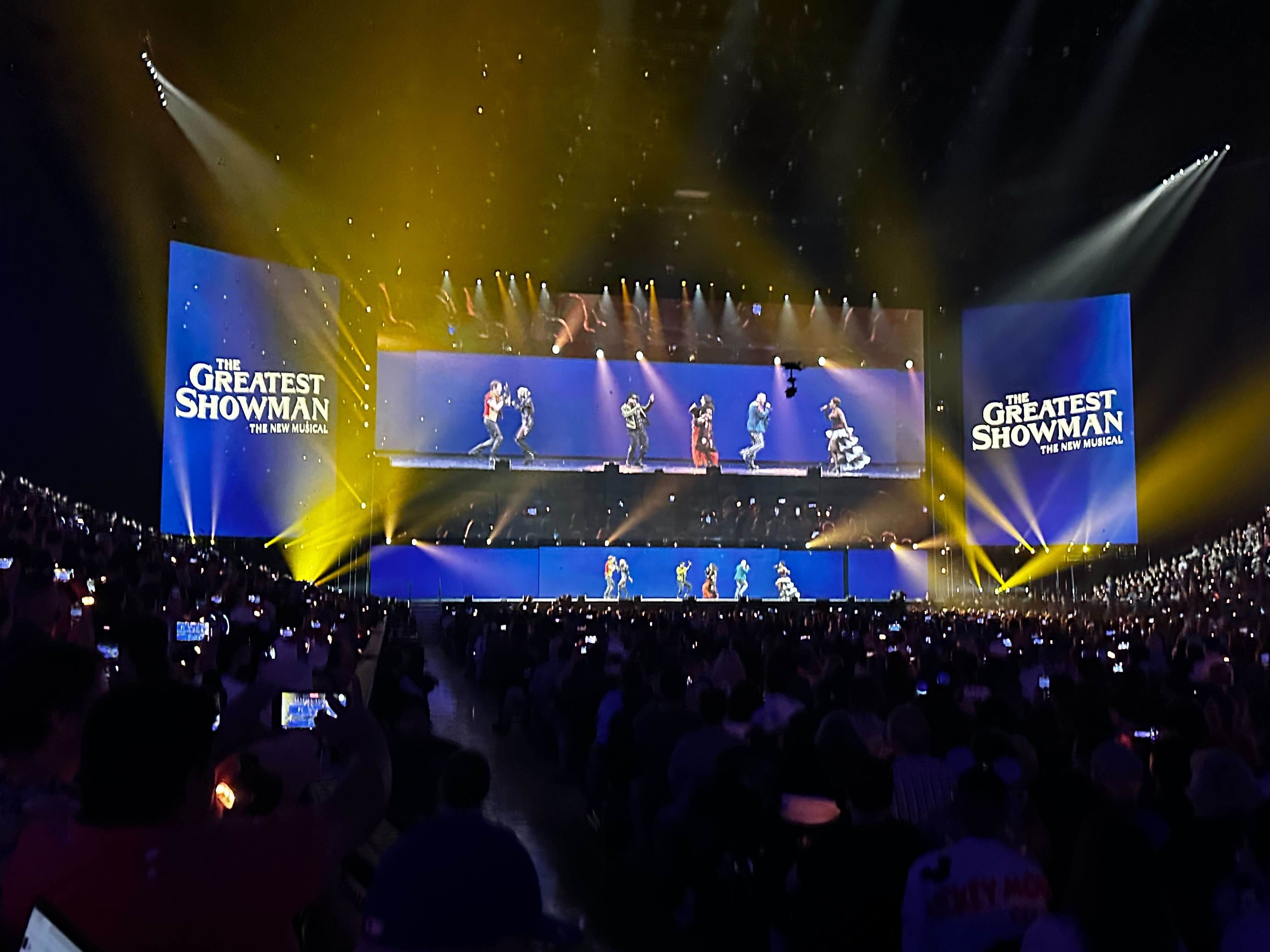 The dancers of “The Greatest Showman” on stage at D23