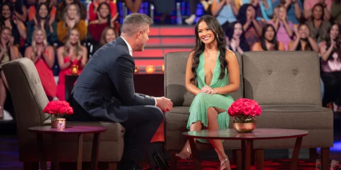 Jenn Tran smiling while sitting across from Jesse Palmer in &lsquo;The Bachelorette&rsquo; Season 21 Men Tell All special.
