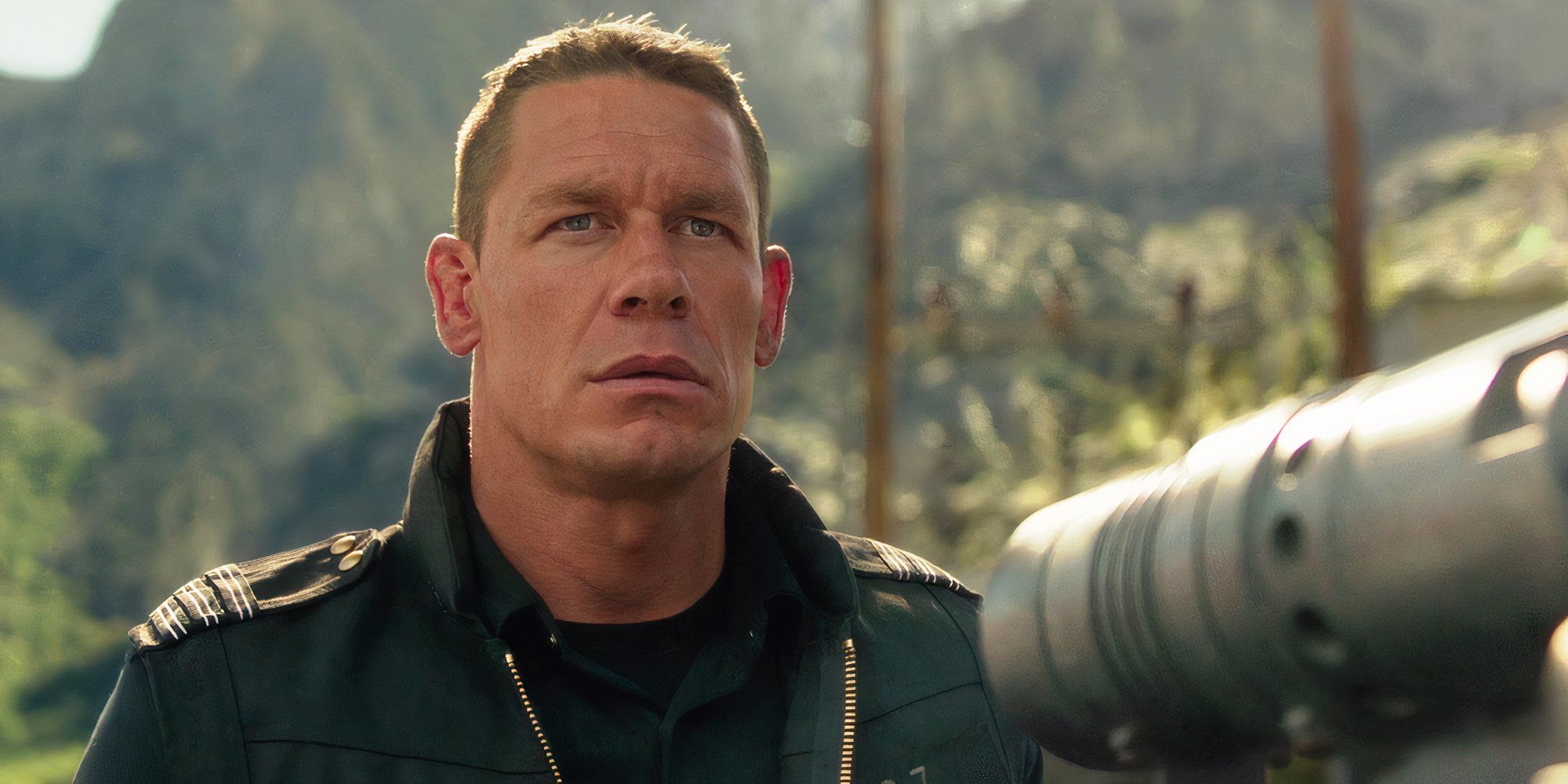 John Cena looking serious in the mountains in Bumblebee (2018)