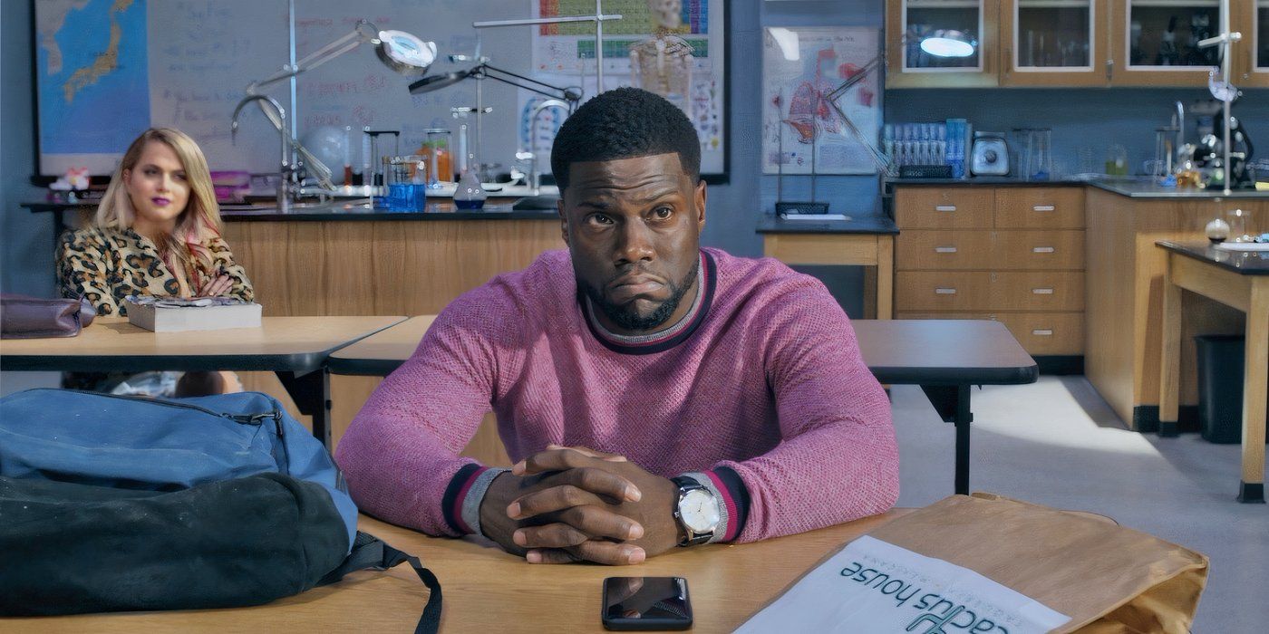 Kevin Hart sitting at a desk in Night School