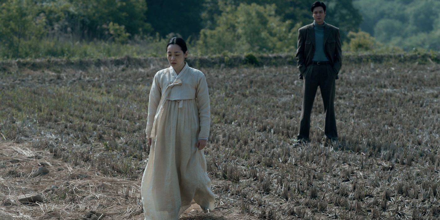 Kim Min-ha and Lee Min-ho, standing on the farm fields, as Kim Sunja and Koh Hansu in Pachinko Season 2