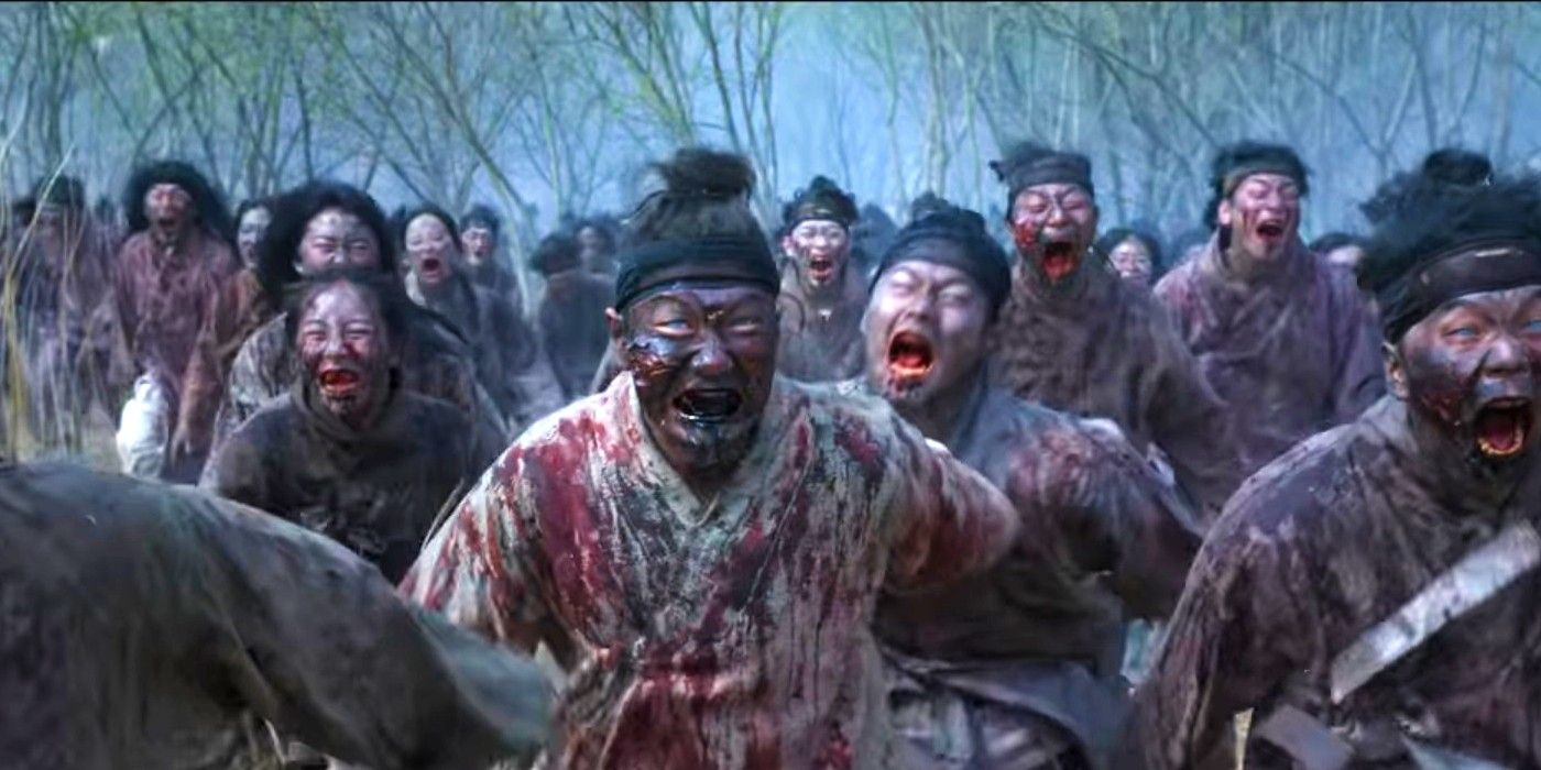 A horde of bloody zombies running forward in Kingdom