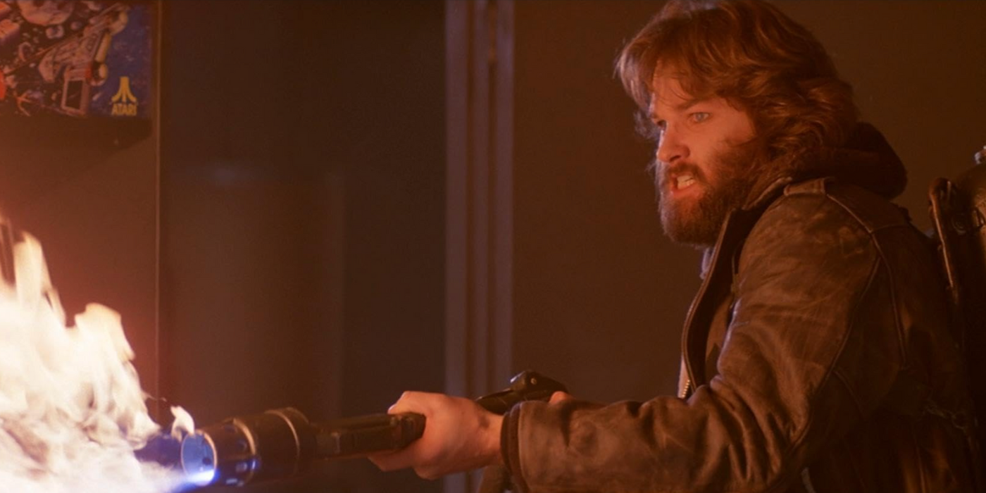 Kurt Russell using a flamethrower in The Thing (1982) 