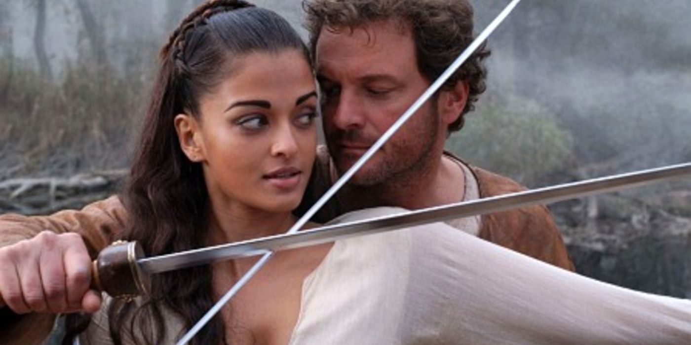 Mira (Aishwarya Rai) and Aurelius (Colin Firth) sword fighting, albeit rather flirtatiously as their faces nearly touch, along with their swords clashing near their necks.