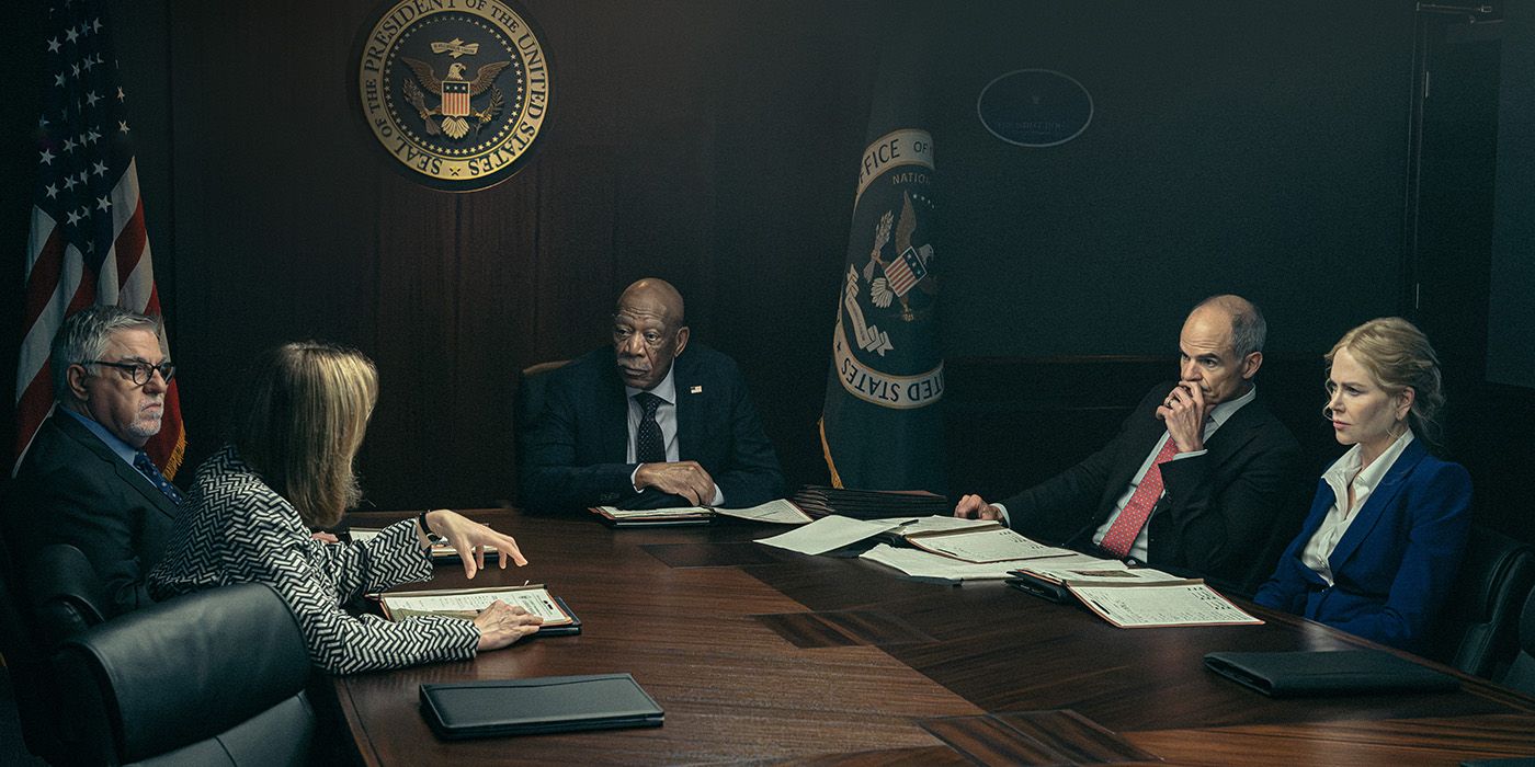 U.S. Secretary of State Edwin Mullins (Morgan Freeman) is joined by Byron Westfield (Michael Kelly), Kaitlyn Meade (Nicole Kidman), and others in an agency meeting in 'Lioness' Season 2.