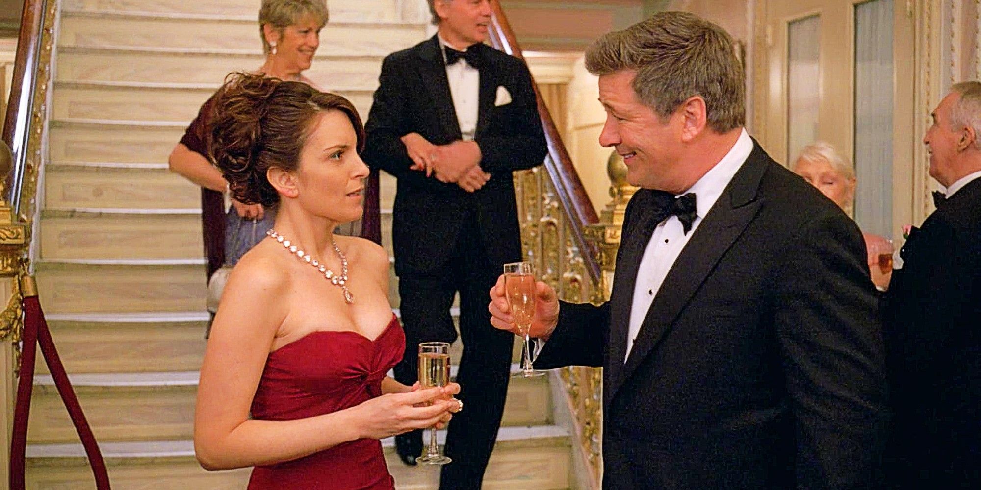 Liz Lemon and Jack Donaghy in 30 Rock "Black Tie" dressed in formal wear and having a serious conversation.