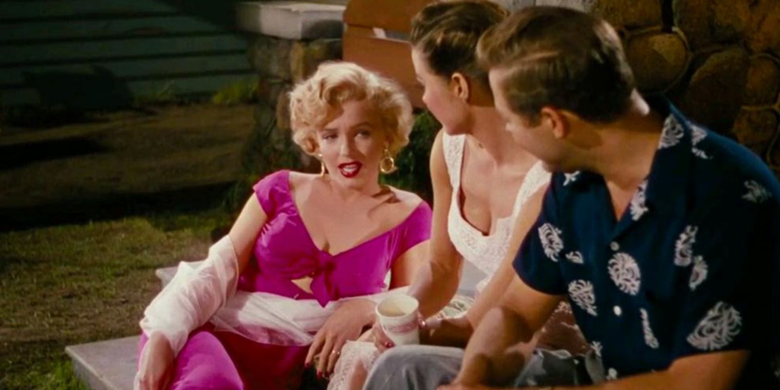 Rose Loomis talking to a couple in Niagara