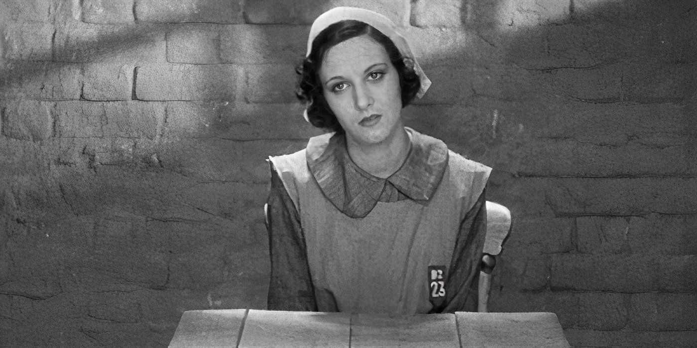 Norah Baring as Diana Baring sitting in a police interrogation room in Hitchcock's Murder!