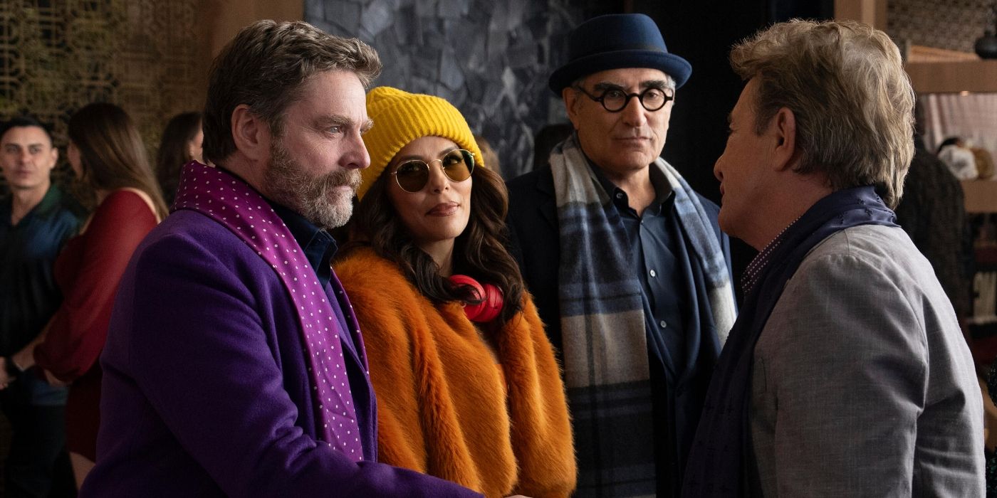 Zach Galifianakis, Eva Longoria, and Eugene Levy dressed as the Only Murders in the Building crew