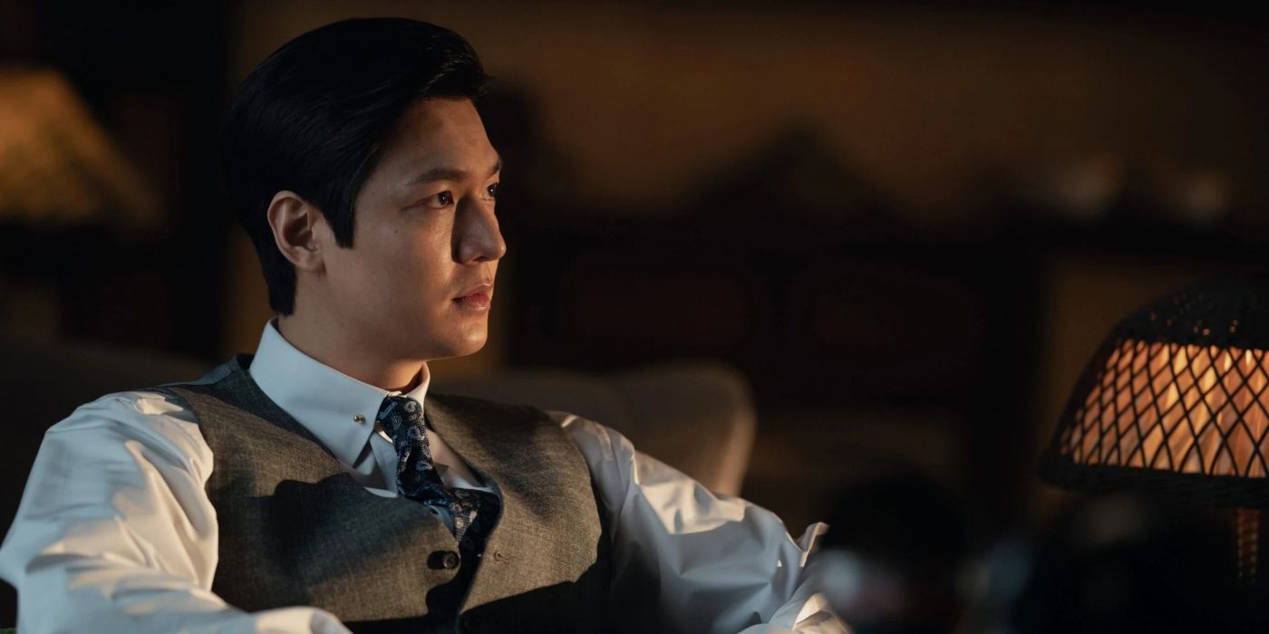 Hansu (Lee Min-ho) sits and looks to the side in a scene from &lsquo;Pachinko.'