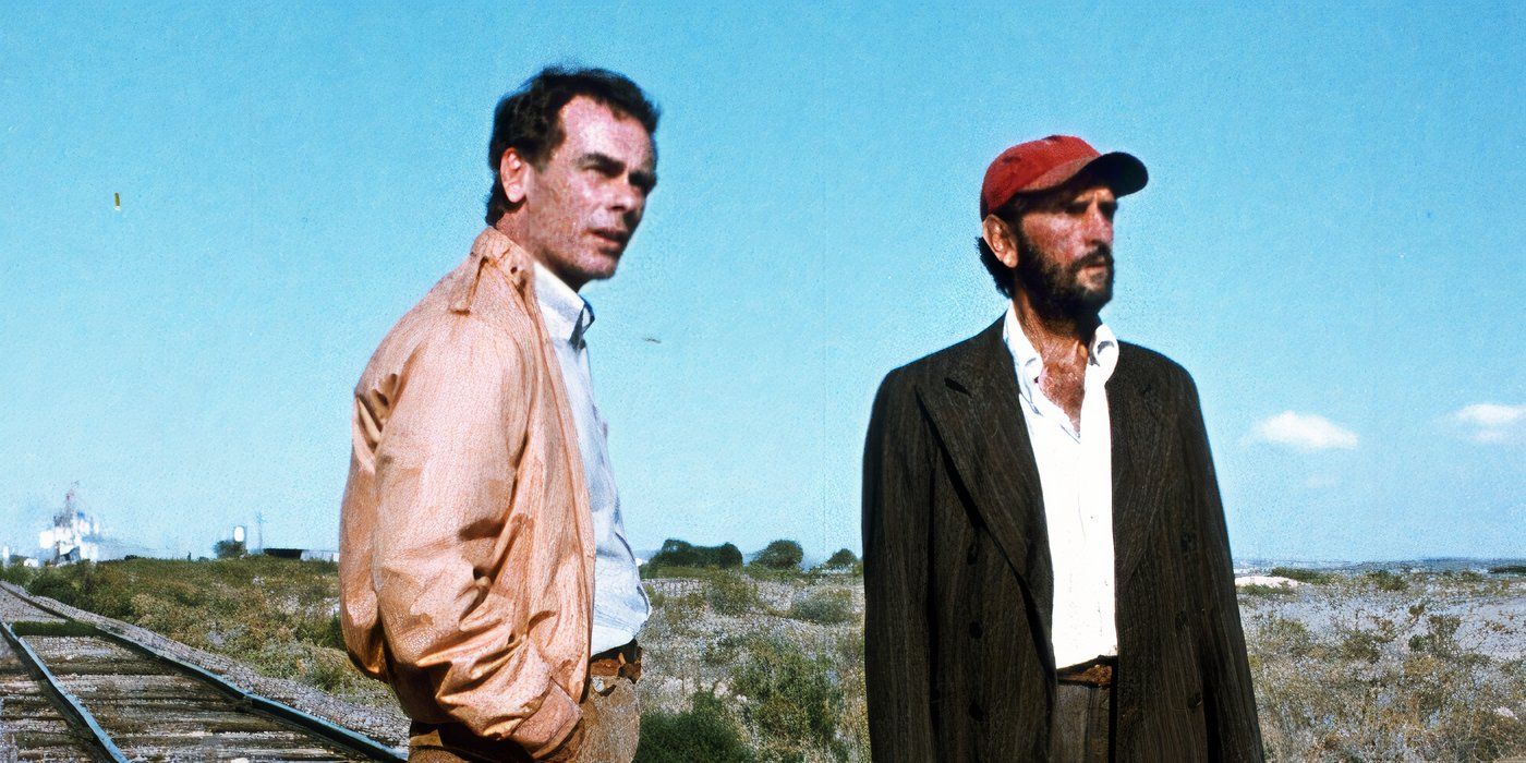 Travis Henderson and Walt Henderson looking to the distance at the desert in Paris, Texas (1984)