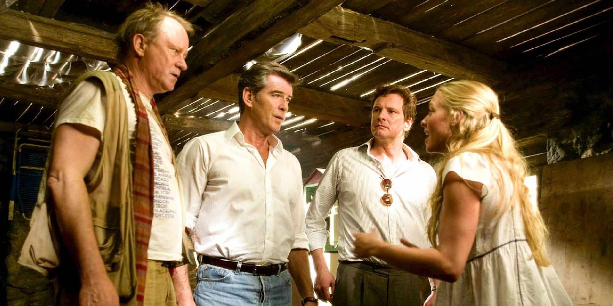 Pierce Brosnan, Colin Firth, and Stellan Skarsgard as Sam, Bill, and Harry looking at Amanda Seyfried as Sophie in Mamma Mia!