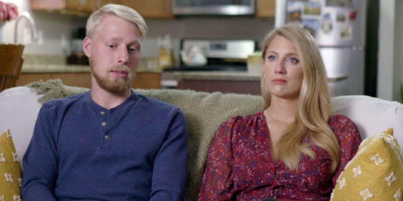 Olivia and Ethan Plath sit on a couch on the set of &lsquo;welcome to plathville&rsquo;