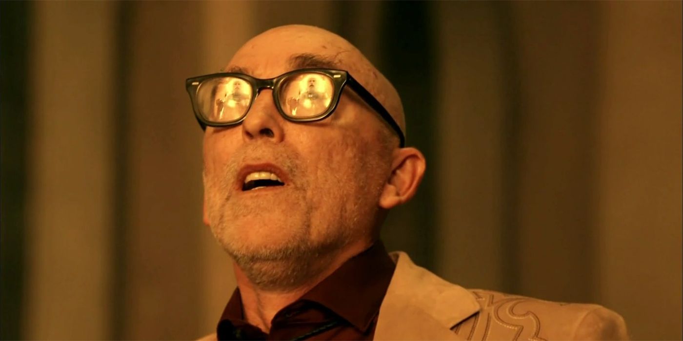 Jackie Earle Haley as Odin Quincannon, looking up at a fire in surprise in “Preacher”