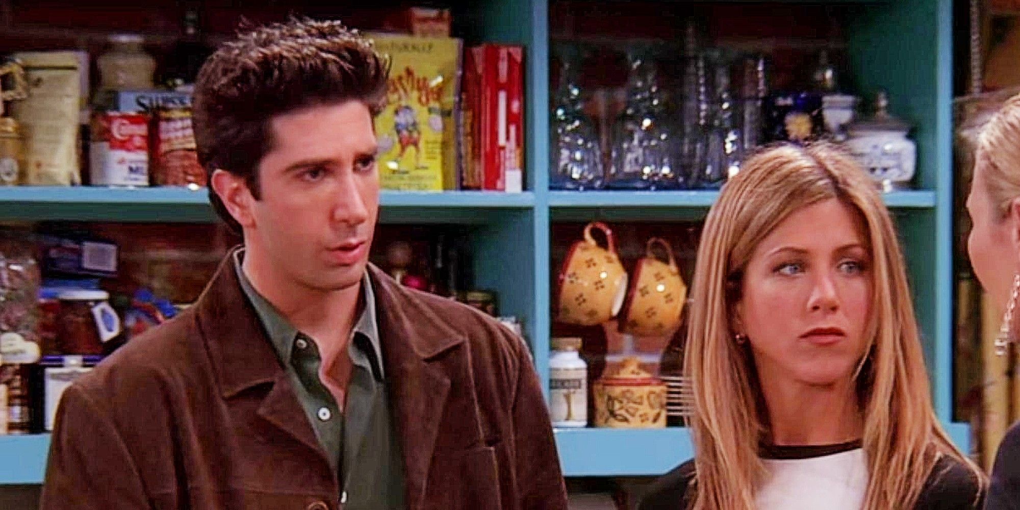 Ross Geller and Rachel Green standing next to each other in Friends