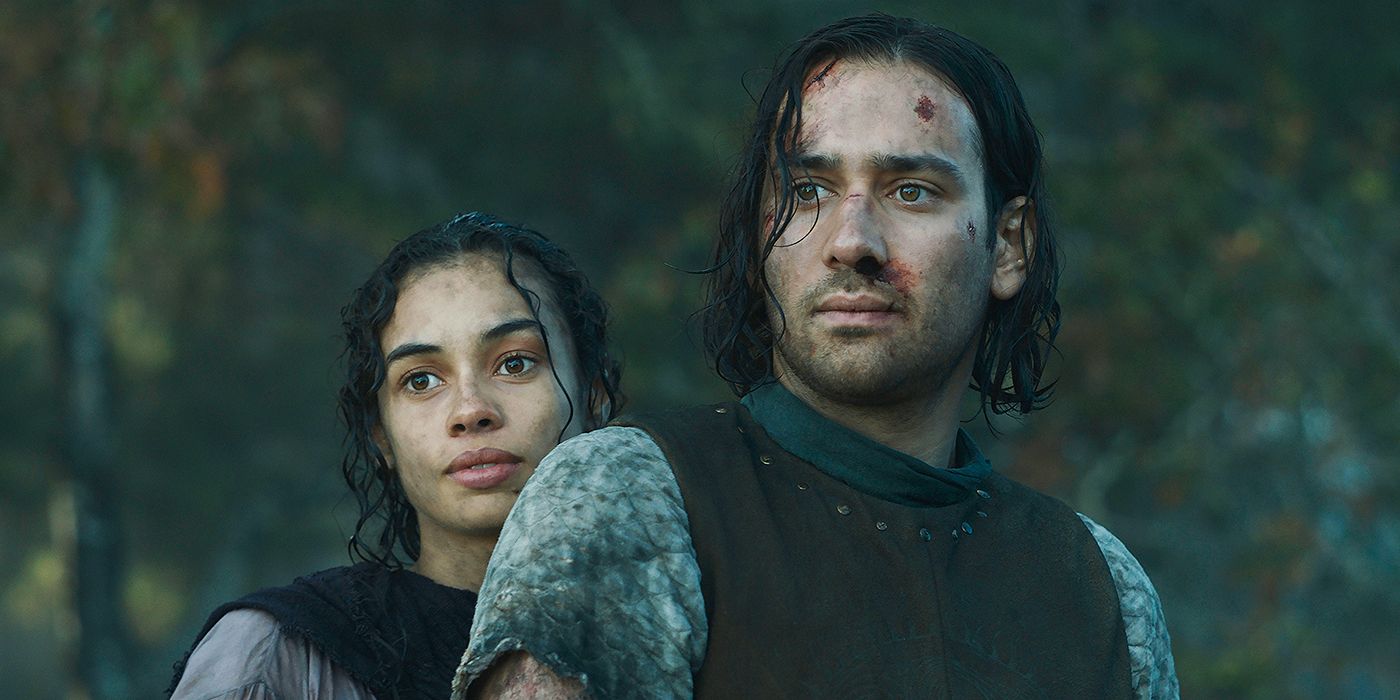 Maxim Baldry as Isildur with Nia Towle as Estrid sitting on a horse together in The Rings of Power Season 2